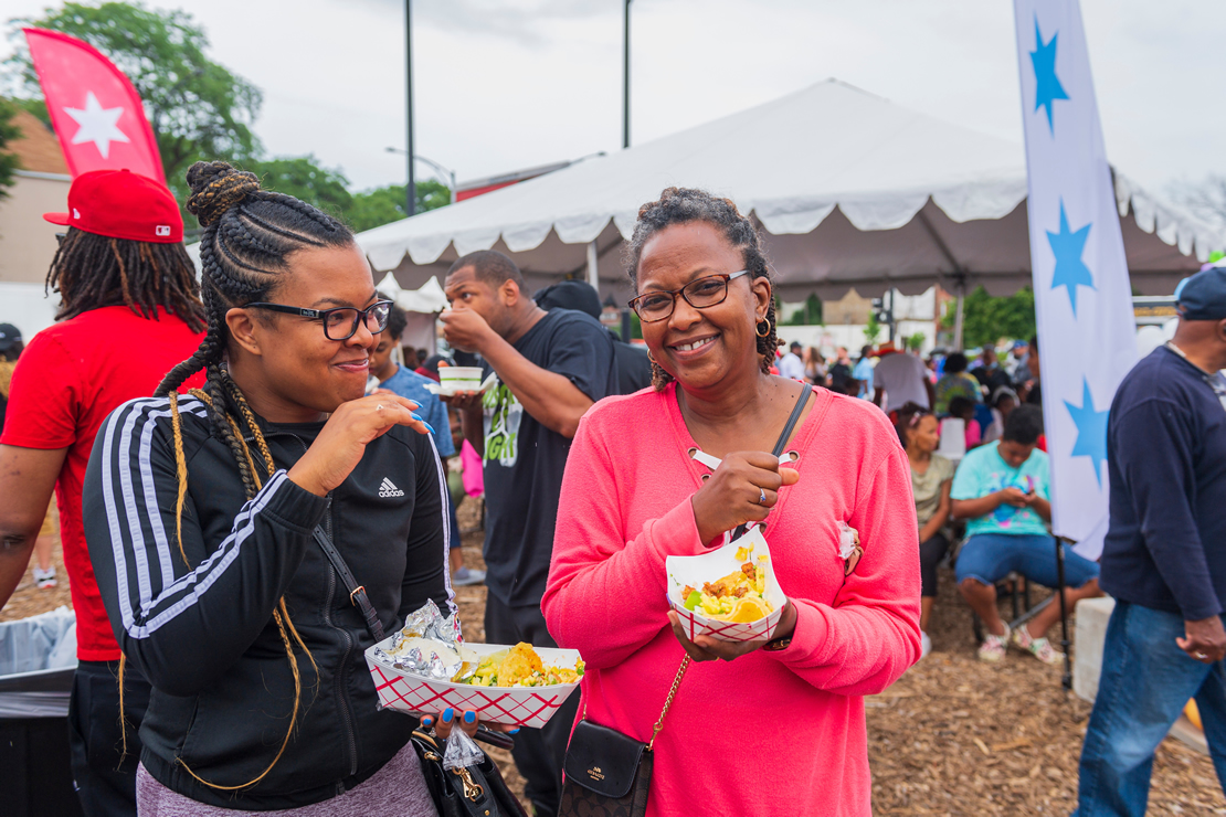 Family enjoying the food at a neighborhood Taste of Chicago